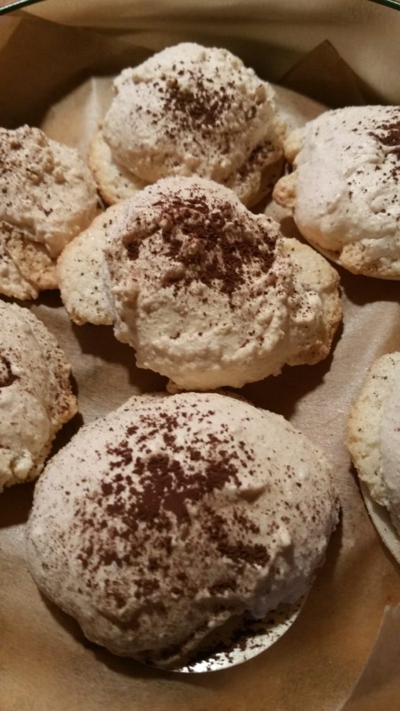 German Christmas Cookies: Almond Macaroons with cocoa powder on top