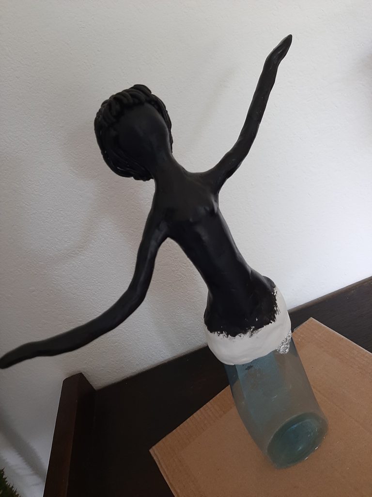 DIY Figurine made of waste plastic bottle: Painting the body black